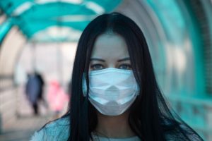 coronavirus covid-2019 Girl in mask fear